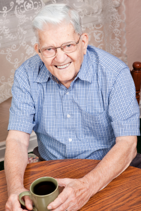 A smiling elderly man.