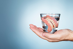 dentures in a glass